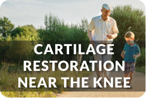 A grandfather jogs down an outdoor path with his school-age grandson. Title reads: Cartilage Restoration Near the Knee